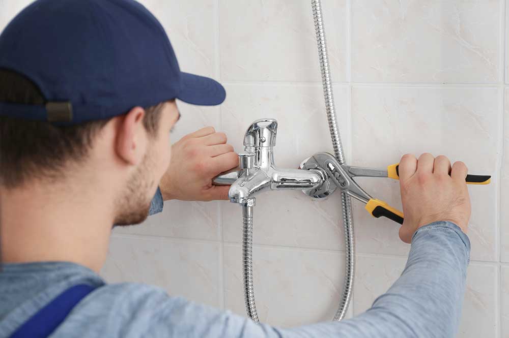How to Repair a Leaking Shower Without Removing Tiles